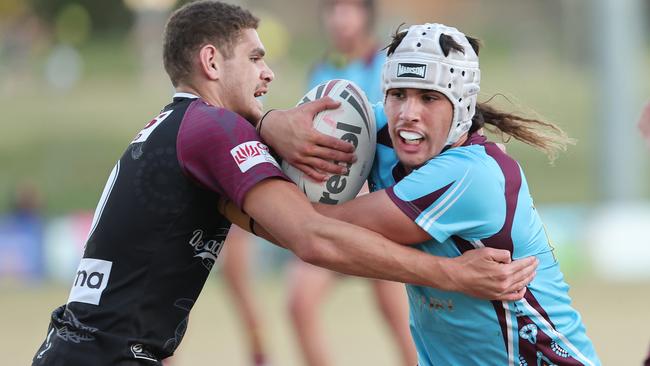 Marsden’s Tippessh Lee tries to contain Keebra's Jack Hamilton earlier in the season. Picture Glenn Hampson