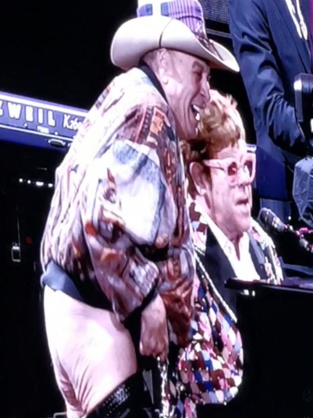 Too rude! Molly Meldrum bares his butt on stage.