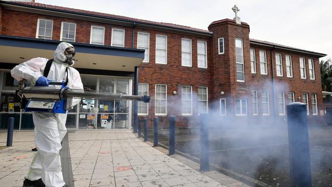 Deep cleaners commence work at St Charles Catholic Primary School at Waverly in Sydney. Picture: NCA NewsWire/Joel Carrett