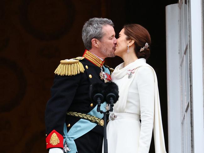 The kiss: King Frederik and Queen Mary. Picture: Reuters