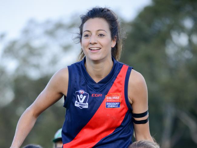 s45dv999 Steph Chioccia after her 150th game (pic: Russ Canham)