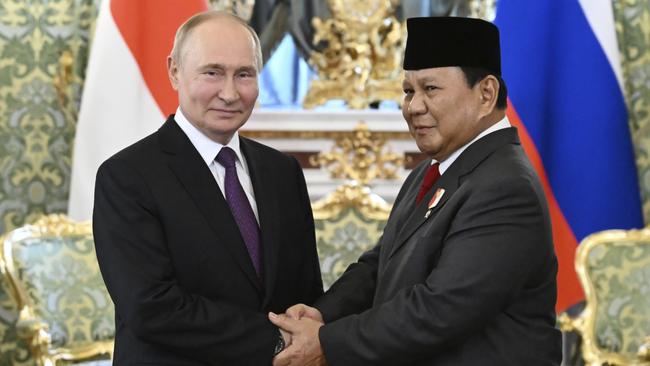 Russian President Vladimir Putin, left, and then Indonesian President-Elect Prabowo Subianto shake hands during their meeting at the Kremlin in Moscow in 2024. (Grigory Sysoyev, Sputnik, Kremlin Pool Photo via AP)