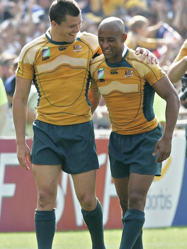 AAC with George Gregan at the 2007 World Cup. Picture: AP