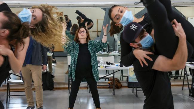 Choreographer Kelly Aykers directs dancers at rehearsals for the show. Picture: Ian Currie