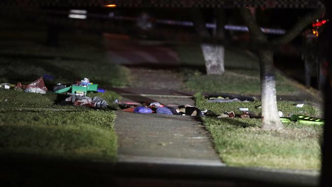 Objects remained strewn on the footpath after the police shooting. Picture: Josh Woning