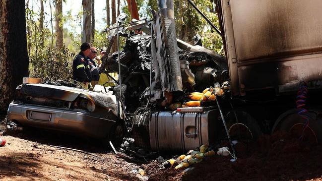 The aftermath of the crash that killed young mum Sharee Harvey near Aratula in 2013. Truck Driver Dale Bayre was this year jailed over his role in the incident.