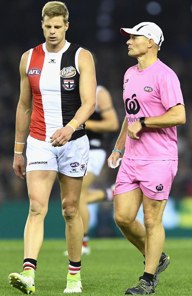 The runner talks to Nick Riewoldt during the Saints win against North Melbourne at Etihad Stadium.