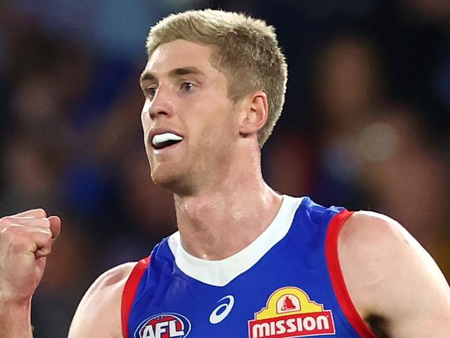 MELBOURNE, AUSTRALIA - MAY 05: Tim English of the Bulldogs celebrates kicking a goal during the round eight AFL match between Western Bulldogs and Hawthorn Hawks at Marvel Stadium, on May 05, 2024, in Melbourne, Australia. (Photo by Quinn Rooney/Getty Images)