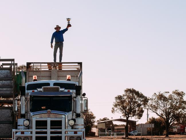 The Melbourne Cup is hoisted above a road train in Blackall in central Queensland.