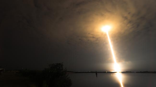 A SpaceX Falcon 9 rocket launches a batch of Starlink satellites into low Earth orbit. The satellites are being used for communication by Ukraine forces.