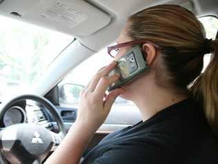 RACQ wants  a mobile phone detection camera trial in Queensland. . Picture: Lee Constable