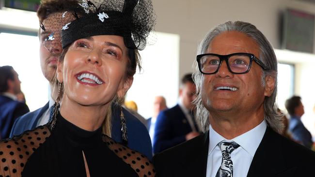 05/11/19 Heloise Pratt with former Noiseworks front man Jon Stevens in the Furphy marquee on Melbourne Cup day at Flemington Racecourse. Aaron Francis/The Australian