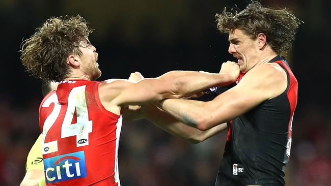 Dane Rampe and Joe Daniher trade moustache grooming tips.