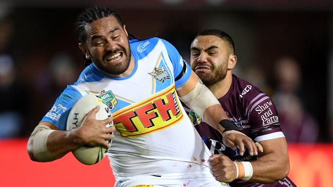 Konrad Hurrell had a mixed night for the Titans. (AAP Image/Dan Himbrechts)