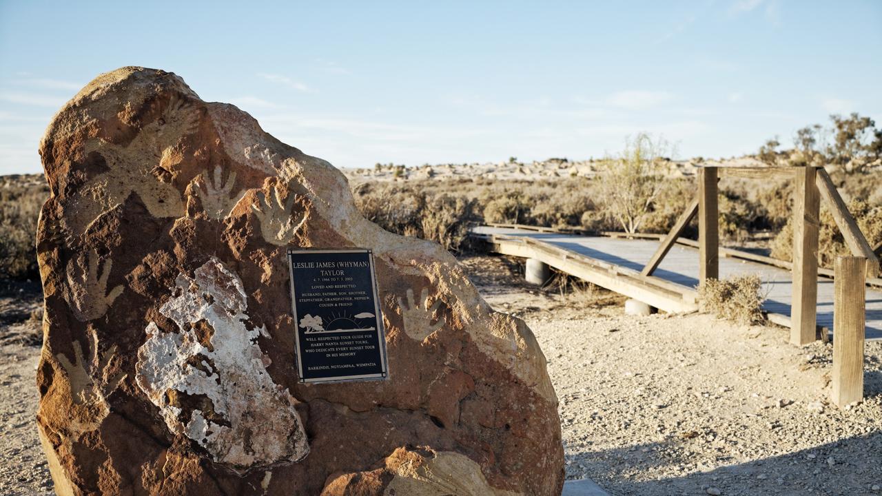 Plaque commemorating the late tour guide Leslie James (Whyman) Taylor in Mungo National Park. Picture: Jonathan Cami