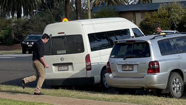 Maverick Robert Carl Fisher ran to a car after he was sentenced in the Roma Magistrates Court.