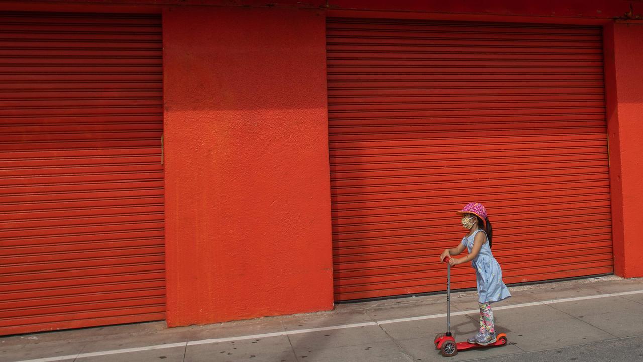 Businesses are gradually reopening across the country, but many remain closed. Picture: Apu Gomes/AFP