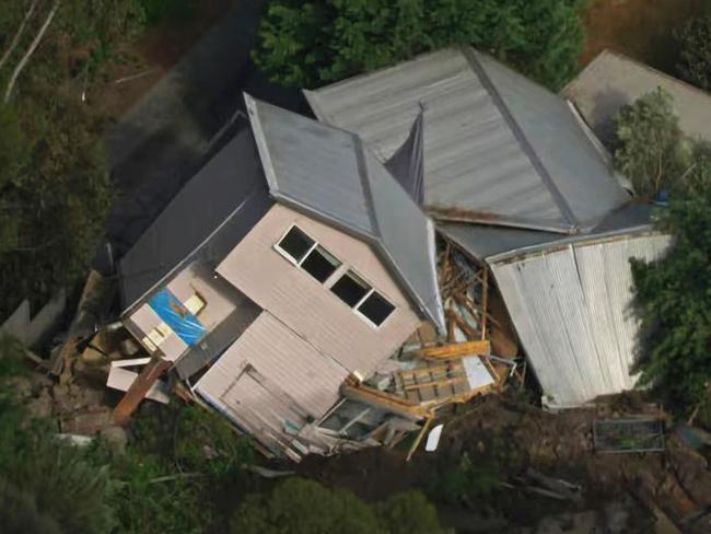 A person has been injured after a house toppled over during an apparent landslide in regional Victoria. Emergency services were called to a property on View Point Rd in McCrae on the Mornington Peninsula - about 59km south of Melbourne - about 8.45am Tuesday after a landslide caused the building to topple over. Picture: ABC