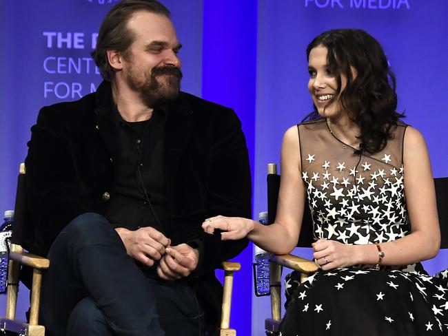 HOLLYWOOD, CA - MARCH 25:David Harbour and Millie Bobby Brown speak onstage at The Paley Center For Media's 35th Annual PaleyFest Los Angeles - "Stranger Things" at Dolby Theatre on March 25, 2018 in Hollywood, California.   Frazer Harrison/Getty Images/AFP == FOR NEWSPAPERS, INTERNET, TELCOS & TELEVISION USE ONLY ==