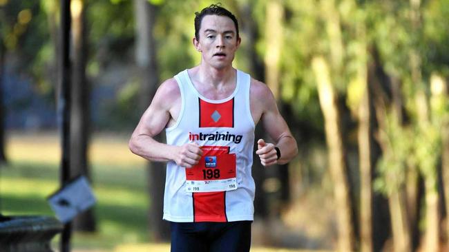 POWERING ON: Brisbane's Brendan Press on his way to winning the male half marathon at the 7 Rocky River Run yesterday. Picture: Allan Reinikka ROK300619a21k1