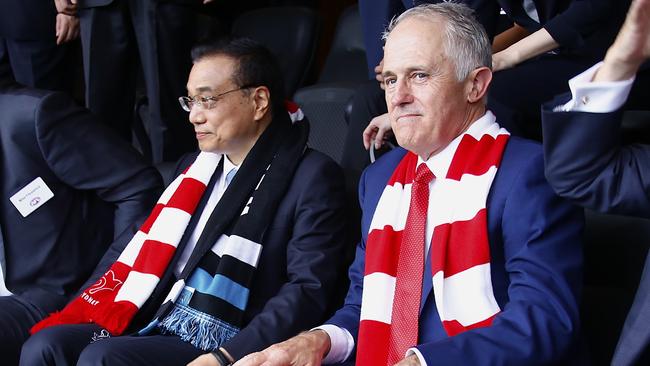 Australia's then Prime Minister Malcolm Turnbull with the now late Chinese Premier Li Keqiang, watching an AFL game at the SCG in 2017. Picture: AAP