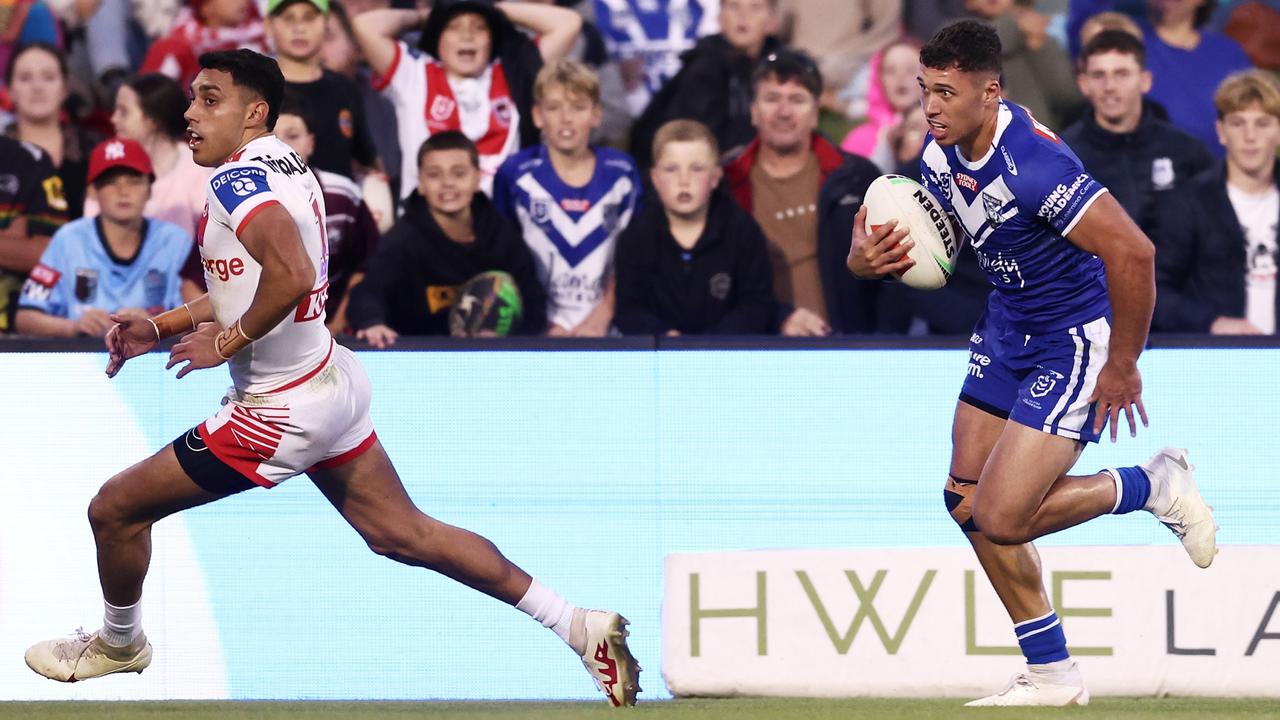 Jake Averillo turns around Tyrell Sloan on his way to the tryline. Picture: Matt King/Getty