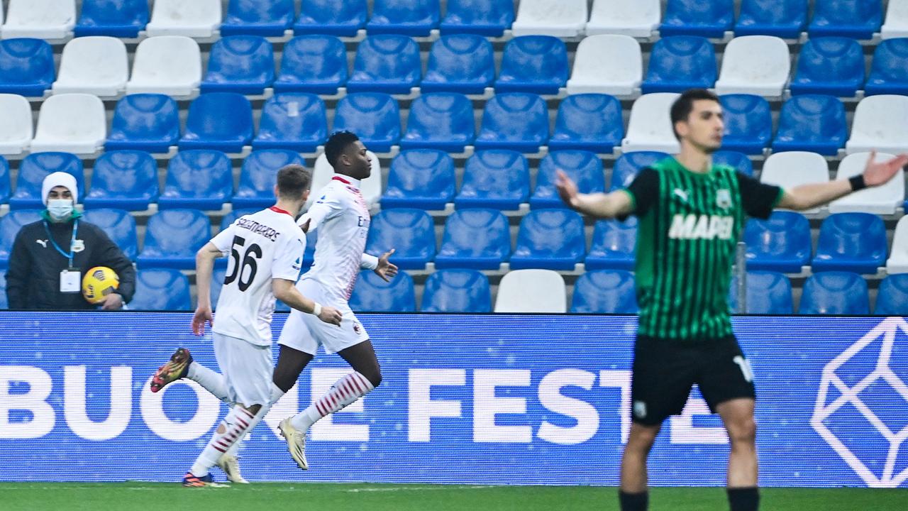 AC Milan's Portuguese forward Rafael Leao (2ndL) celebrates after opening the scoring in just six seconds.