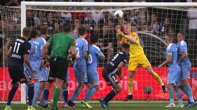 Ola Toivonen of Melbourne Victory scores as goal after Melbourne City goalkeeper Tom Glover parries the ball into the net Picture: AAP