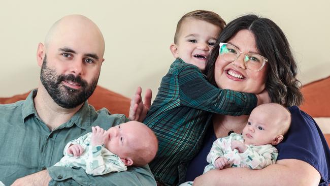 Toddler Jack Webber, 2, with mum Emily and dad Brad and his new siblings, Oliver and Sophie. Picture: Russell Millard