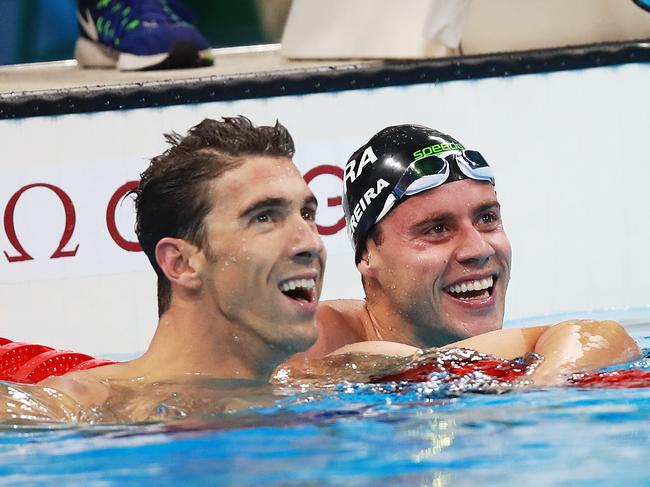 Michael Phelps of the USA with Thiago Pereira of Brazil in the men's 200m individual medley heat on day five of the swimming at the Rio 2016 Olympic Games. Picture. Phil Hillyard