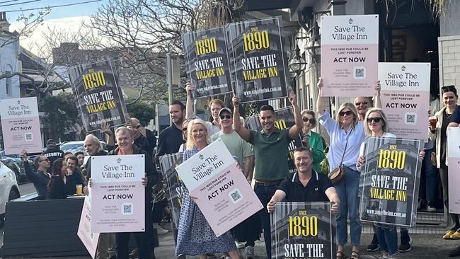 Woollahra Councillor Harriet Price, centre, and Sydney MP Alex Greenwich, centre right, joined the rally to protest the DA.