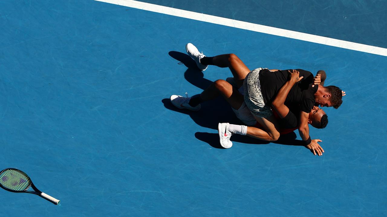 Kyrgios and Thanasi Kokkinakis celebrate match point Picture: Clive Brunskill/Getty Images