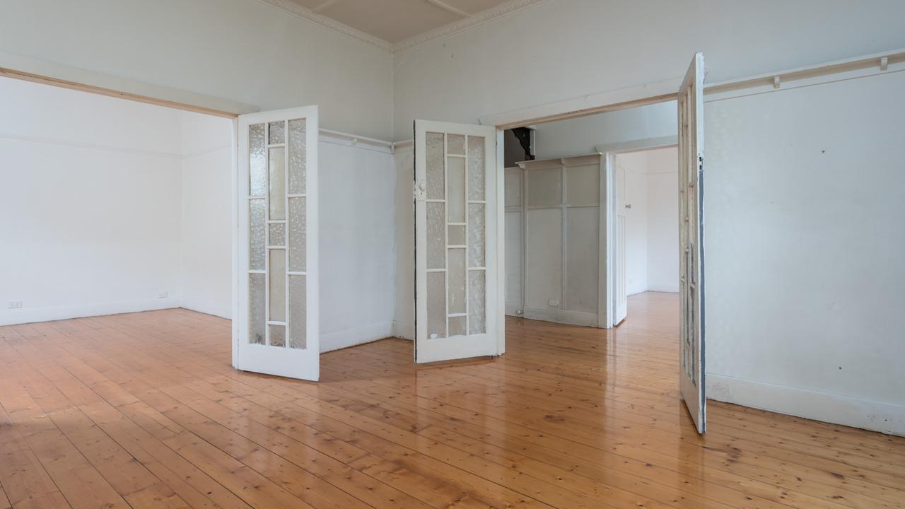 The home’s interior still showcases many classic features, including polished floorboards, picture rails and a decorative ceiling.