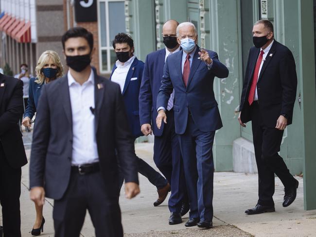 Joe Biden, with wife Jill and his security detail, leaves an event in Wilmington, Delaware. Picture: Angus Mordant