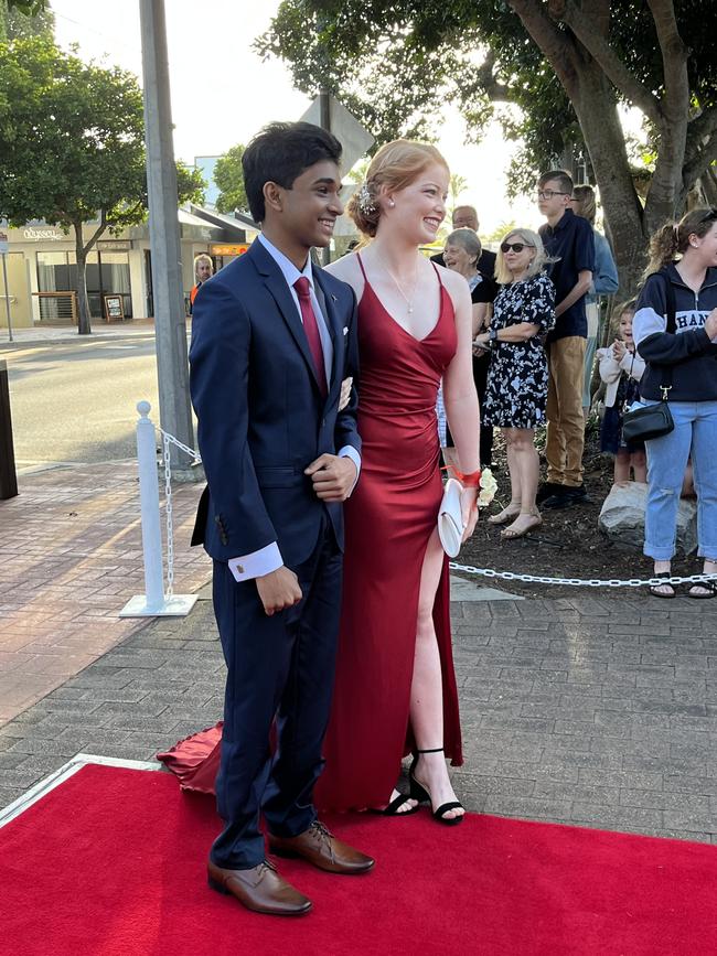 Aaron Shanmugan and Chloe Hurford arrive at the formal in a 1927 Whippet.