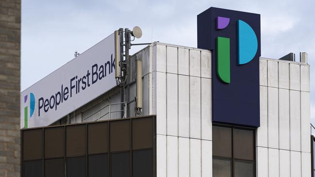 Heritage Bank head office building in Ruthven St now displays the merged rebranded name of People First Bank, Friday, June 21, 2024. Picture: Kevin Farmer