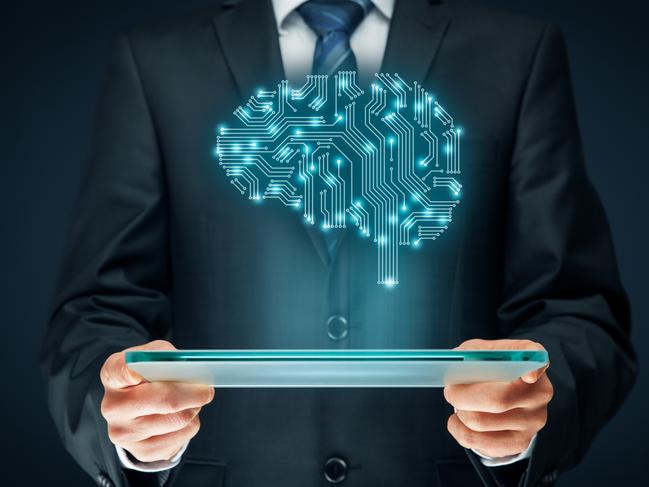 Artificial intelligence (AI), data mining, expert system software, genetic programming, machine learning, deep learning, neural networks and another modern computer technologies concepts. Brain representing artificial intelligence with printed circuit board (PCB) design. Istock