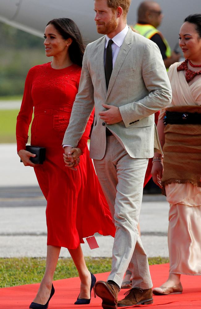 In this photo, the price tag of Meghan's dress by Self-Portrait is visible. She has been advised to rein in her ‘extravagant’ spending. Picture: Reuters