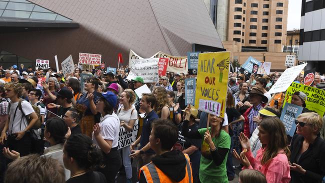 Environmental protesters rally against Labor’s position on the Adani mine outside the Adelaide Convention Centre. Picture: AAP / Lukas Coch 