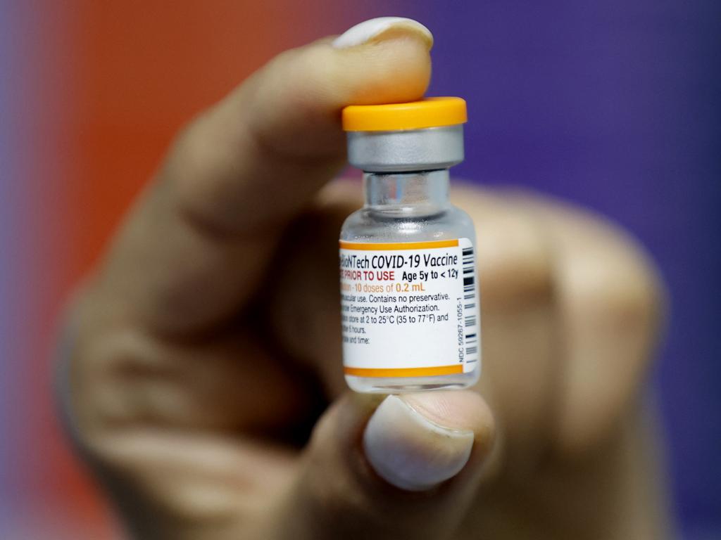 The smaller Pfizer doses for children under 12 will be distributed in orange-capped vials to distinguish them from the larger vaccines. Picture: JACK GUEZ / AFP