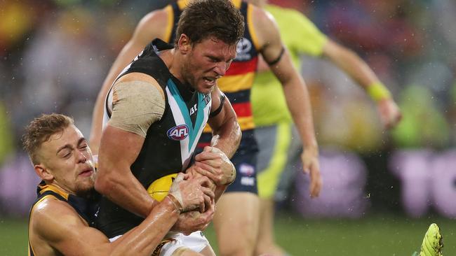 Adelaide’s Hugh Greenwood brings down Port’s Brad Ebert of the Power during the 2017 round 20 Showdown at Adelaide Oval.                        <a capiid="d85176b8c1cadac6db312d233fcd862b" class="capi-video">Crows press conference</a>