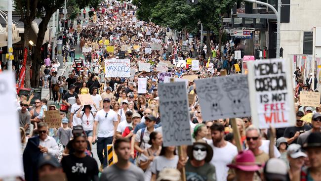 Anti-vax protesters march through the Brisbane CBD. Picture: Peter Wallis