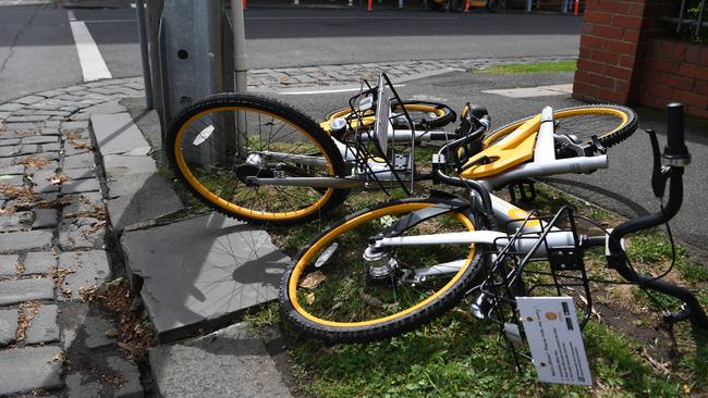 oBikes sit pushed over in Melbourne. Picture: James Ross