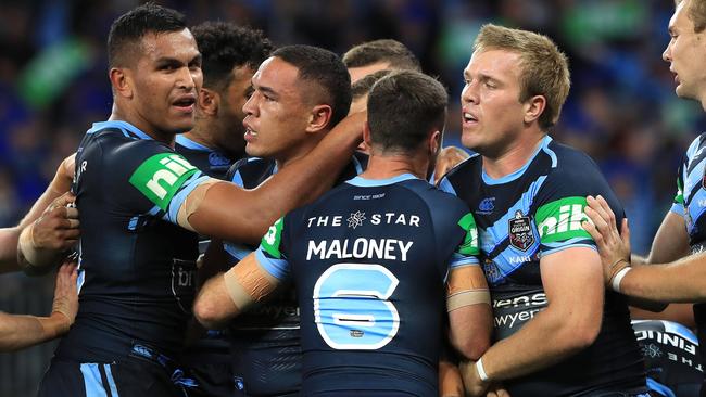 Tyson Frizell celebrate scoring a try with his Blues teammates. Picture: Adam Head