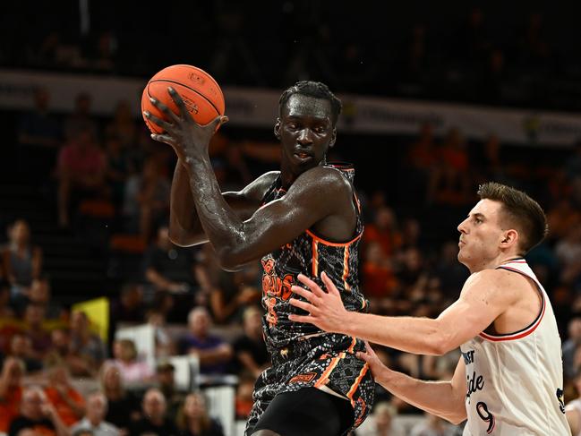 Akoldah Gak of the Taipans catches the rebound during the round 15 NBL match (Photo by Emily Barker/Getty Images)