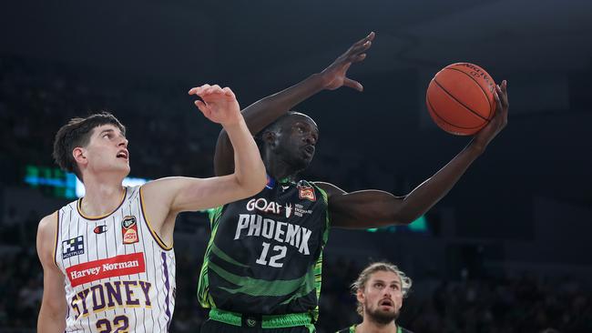 MELBOURNE, AUSTRALIA – FEBRUARY 17: Gorjok Gak of the Phoenix rebounds the ball during the round 20 NBL match between South East Melbourne Phoenix and Sydney Kings at John Cain Arena, on February 17, 2024, in Melbourne, Australia. (Photo by Daniel Pockett/Getty Images)