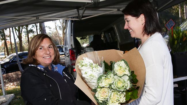 LIVERPOOL LEADER/AAP.  Kathleen Padovano from Jonima flowers at the Liverpool Growers and foodies market in Chipping Norton on Saturday  15 June, 2019.  The council is launching its Love Liverpool campaign today at the Liverpool Growers and Foodies Market. (AAP IMAGE / Carmela Roche)