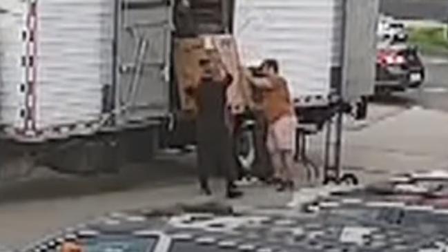 CCTV footage showing the three NSW removalists at the Ariele Apartments. Picture: Channel 7