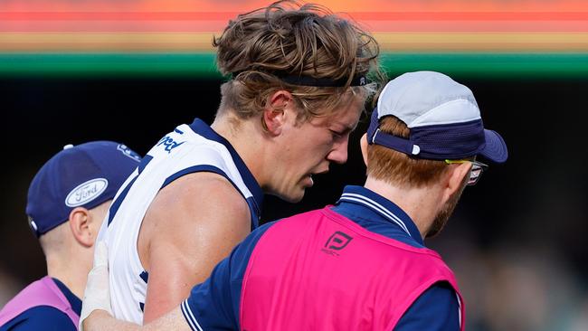 Rhys Stanley was helped from the ground against West Coast after fracturing his right eye socket, with the ruckman to stay in Adelaide for surgery on Monday. Picture: Dylan Burns / Getty Images