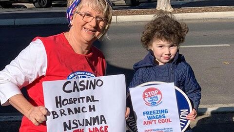 The NSW Nurses and Midwives Association Casino Branch president Shirley Roach outside Casino Post Office protesting against the state government's wage freeze.